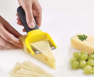 Slice cheddar or shave parmesan with the Joseph Joseph multi-slice cheese plane. Dual stainless blades, anti-stick surface, and ergonomic handle.