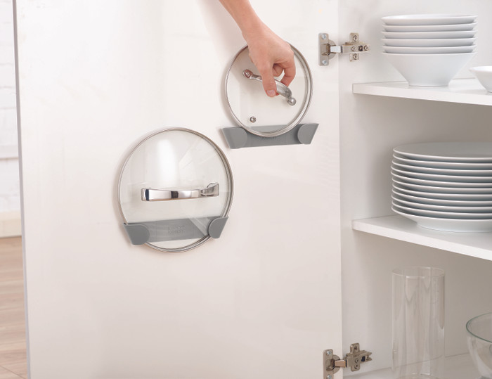 673b53a5-1eab-4073-ac24-70d6e41d60f0.jpg.jpg Pan Lid Holders for Cupboard Doors Space-Saving, Tool-Free & Essential | Joseph Joseph