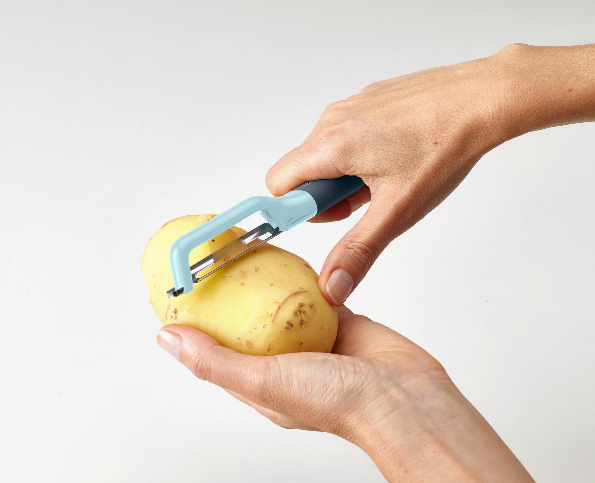 e2692962-0d76-46aa-860e-4da1cf98474b.jpg Swivel Vegetable Peeler Ultimate Non-Slip Peeler